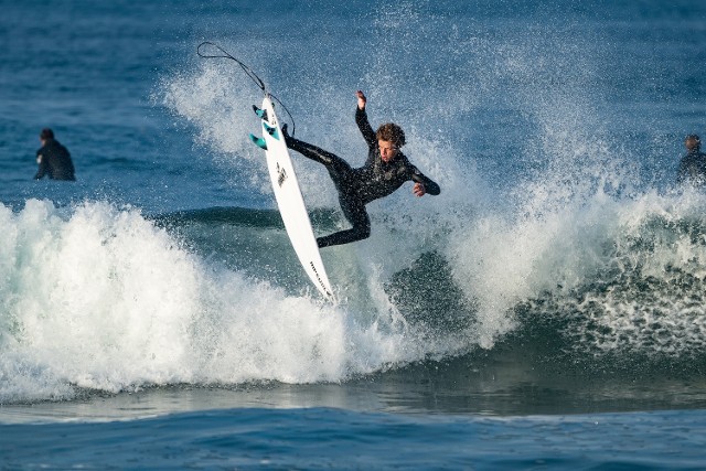 Jonny Herrouin surfing. Frontside air on a head high right. Jonny Herrouin surfing. Frontside air on a head high right.