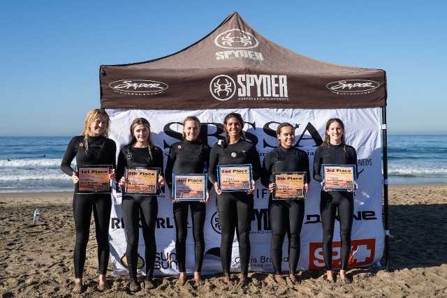 Womens KOC finalists 2024 pictured with awards on beach Womens KOC finalists 2024 pictured with awards on beach